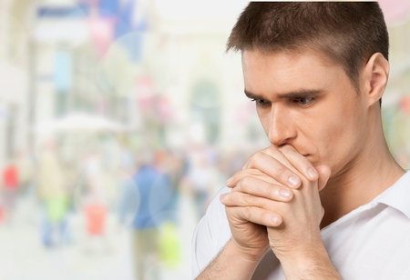 Praying.