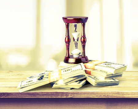 Hourglass on Money.の写真素材