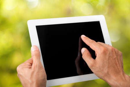 Finger on Digital Tablet.の写真素材