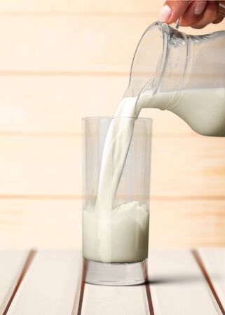 Pouring milk.の写真素材