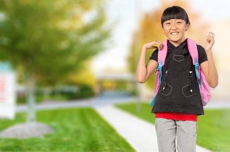 Little girl going to school の写真素材