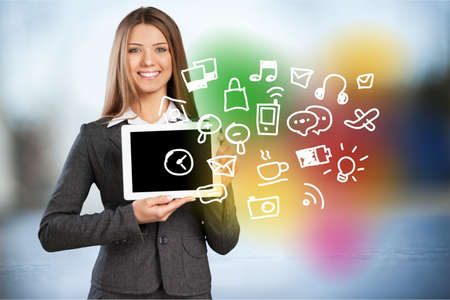 Woman holding Tablet apps.の写真素材