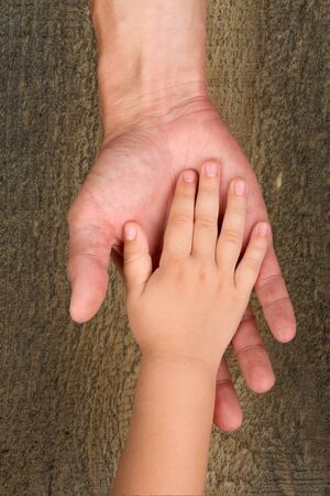 Reaching child hand.
