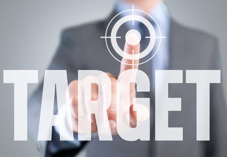 Man pointing the text: Target.の写真素材