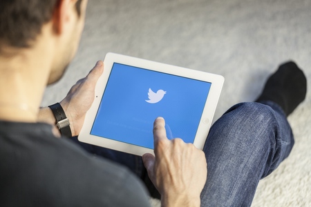 Twitter logo on white apple ipad.のeditorial素材