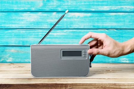 Retro radio and hand close-up viewの写真素材