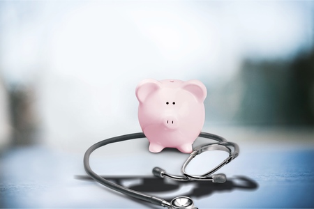 Piggy bank with stethoscope.の写真素材
