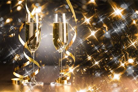 Two champagne glasses.