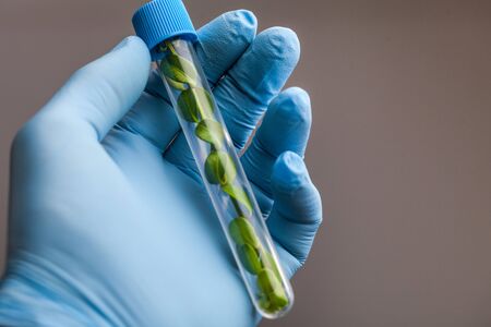 Hand with tube.の写真素材