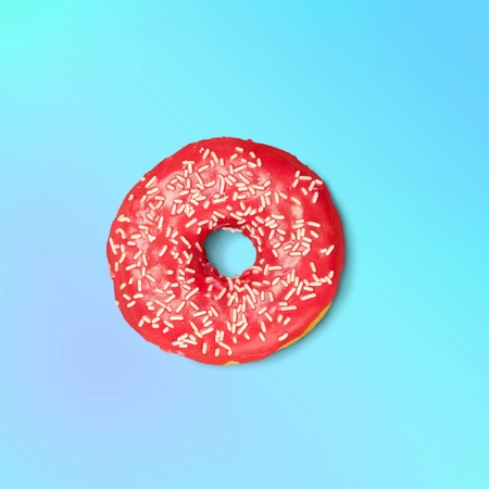 Doughnut on color background.の写真素材