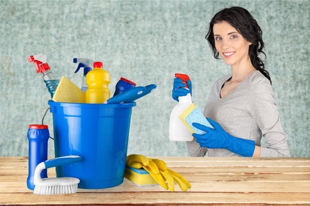 Cheerful woman cleaningの写真素材