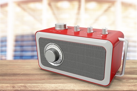 Old retro radio on wooden backgroundの写真素材