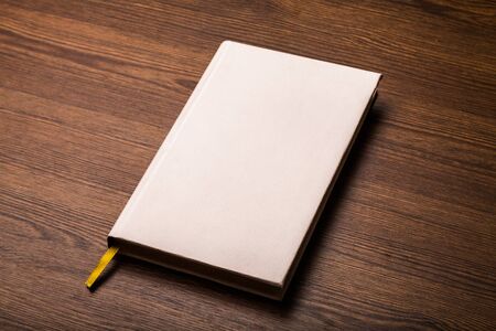 Hardcover Book on wood desk