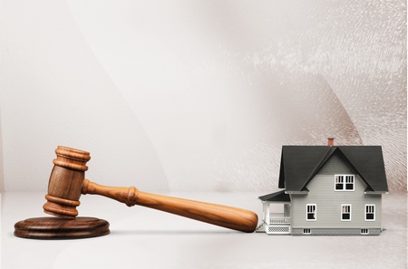 Golden scales of justice, gavel and books isolated on whiteの写真素材