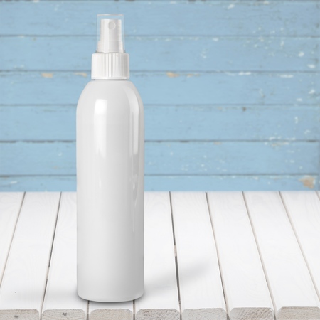 Hair care bottles isolated on whiteの写真素材