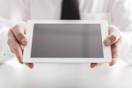 Business man holding  digital tablet,close upの写真素材