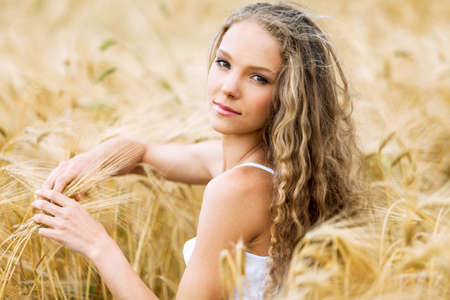 Vintage portrait of a beautiful girl in a magical placeの写真素材