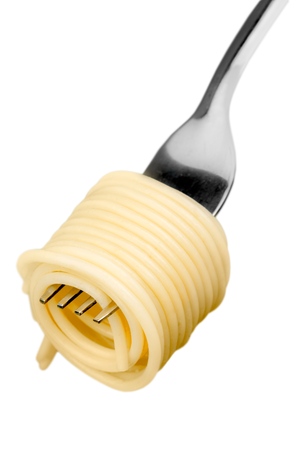 Fork with just spaghetti around it on backgrouundの写真素材