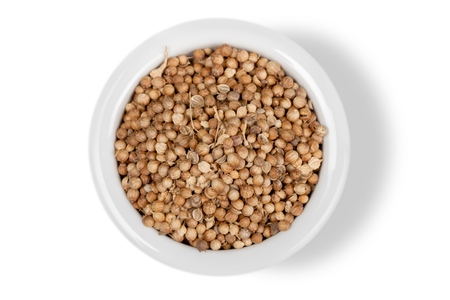 Various kinds of spices in sixteen white square bowlsの写真素材