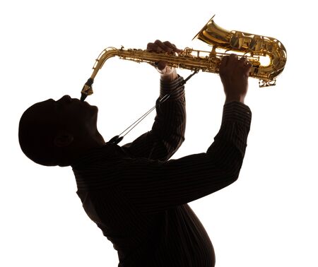 saxophonist at dusk 2の写真素材