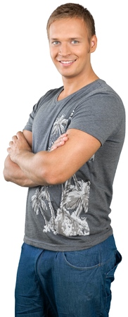Casually dressed male wearing a t-shirt with his arms crossed