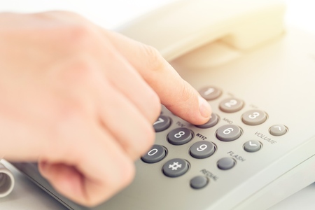 Dialing telephone keypad concept for communication, contact us and customer service supportの写真素材