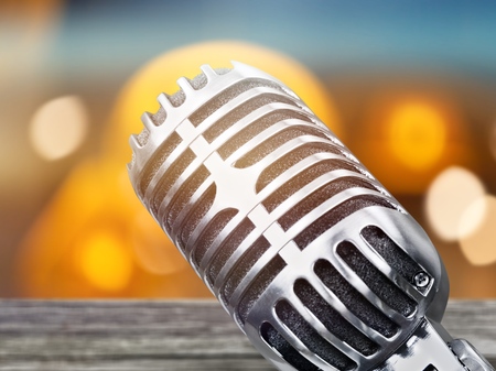 Microphone on abstract blurred of speech in seminar room or speaking conference hall light, Event Backgroundの写真素材