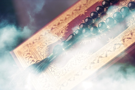 Islamic Holy Quran and Subha on Soft Light Backgroundの写真素材