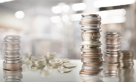 Euro coins. Euro money. Euro currency.Coins stacked on each other in different positions. Money...