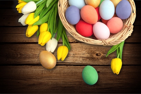 Easter eggs on meadow in springtime