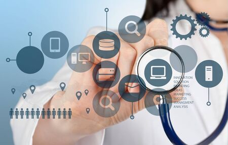 Doctor holding stethoscopeの写真素材