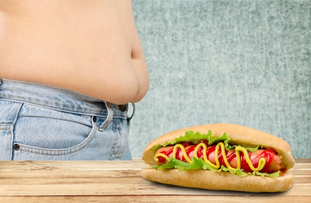 Woman belly isolated on white background from fat to thin. Diet concept.の写真素材