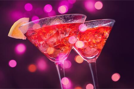 Cocktails with Ice Cubes and Lemon Garnish