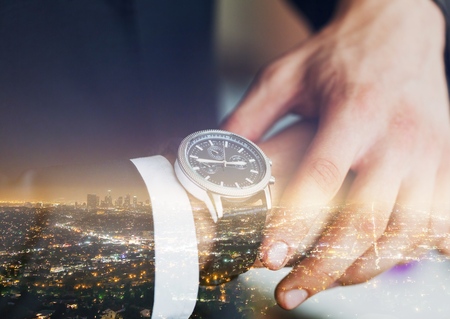 Businessman Checking the Timeの写真素材