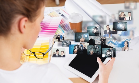 Closeup image of human hands holding tabletの写真素材