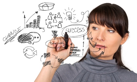 Woman in grey flannel holding marking penの写真素材