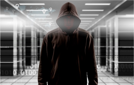 Silhouette of a hacker isolated on white with binary codes on background
