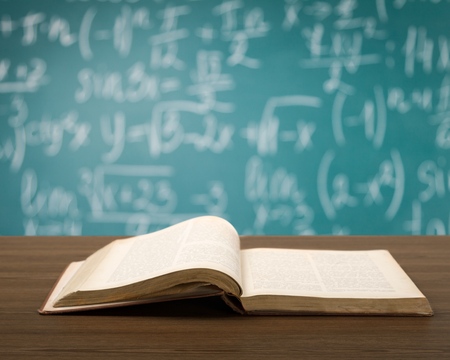 Open book on wooden deckの写真素材