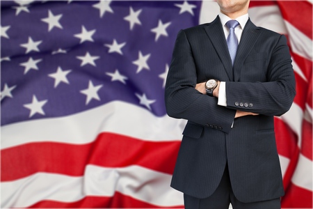 man in suit on a flag backgroundの写真素材