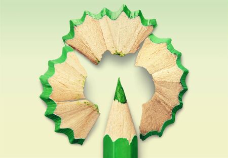 pencil shaving around red green and blue three colored pencil like flowerの写真素材