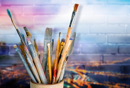 Old paintbrushes isolated on whiteの写真素材
