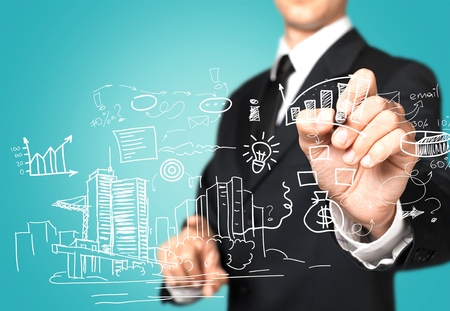 businessman hand working with new modern computer and business strategy as conceptの写真素材