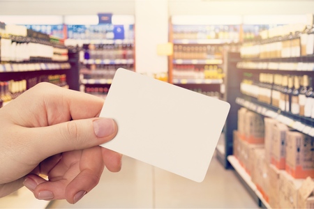 Empty card in hand in shop