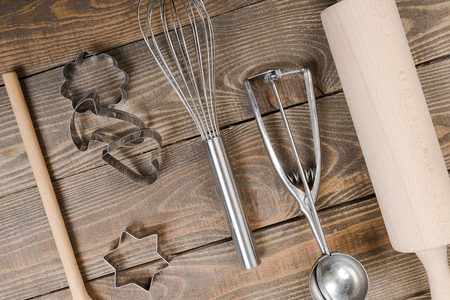 Old Vintage wooden rolling Pin with hand-cranked mixer and egg beater