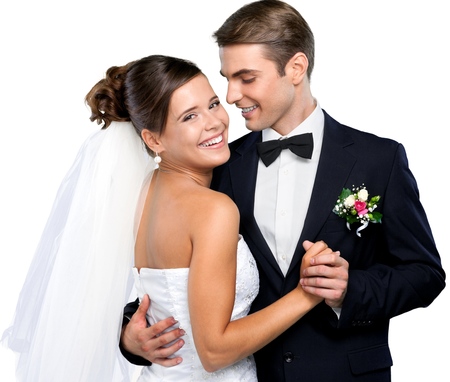 Young wedding couple isolated on whiteの写真素材