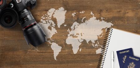 Vintage Camera and Leather Notebook Flat Lay With Passport on Wooden Mapの写真素材