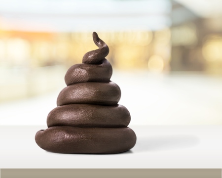 Poop emoticon on bright background. Minimal concept.の写真素材