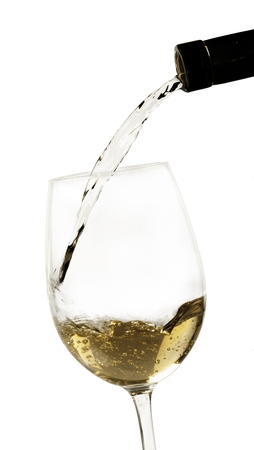 Pouring White Wine into a Glass - Isolatedの写真素材