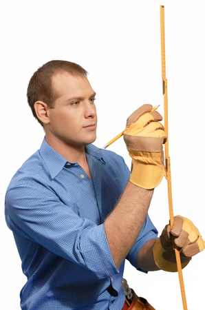 Construction Worker Measuring and Writing - Isolated