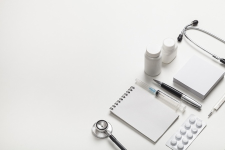 Collection of equipment medicine on the doctor's desktop. Medical concept.の写真素材